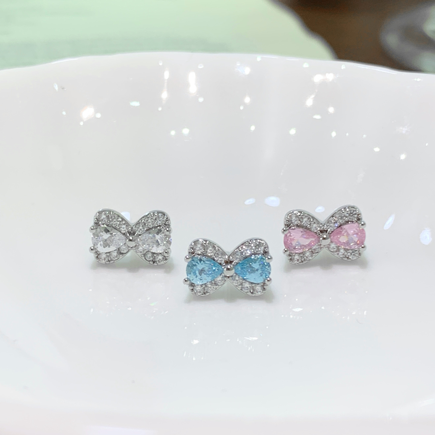 Bow Tie Cartilage Earrings For Women In Titanium Alloy With Platinum Plating And Zircon Inlay Featuring Flat Back Studs