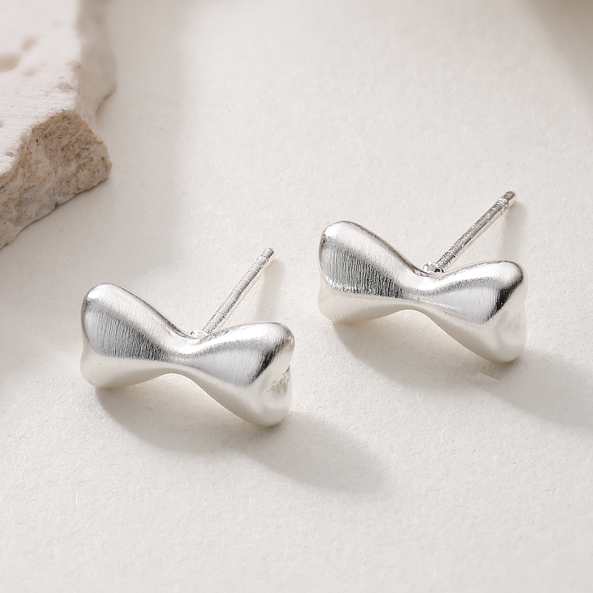Brushed Bow Tie Stud Earrings For Women In Copper With 18K Real Gold Plated Water Plating And 0.03µm Thickness 2