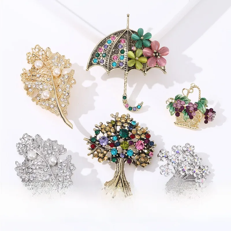 Electroplated Alloy Flower Pin With Artificial Crystal Inlay In Gold