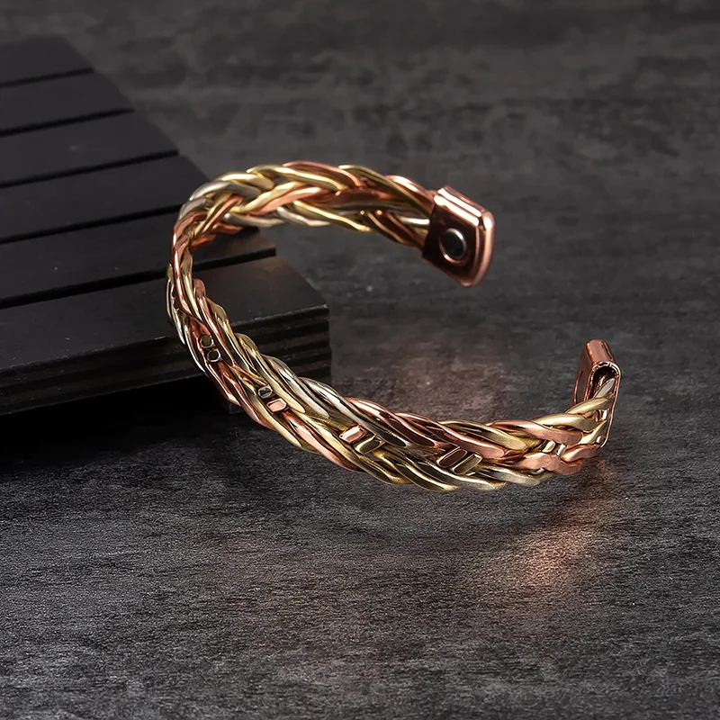 Geometric Braid Bangle In Copper With Golden Electroplated Finish Featuring Magnetic Clasp Closure