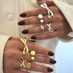 Bow Tie Ring For Women In Zinc Alloy Featuring KC Golden Plated Electroplated Finish With Asymmetrical Design