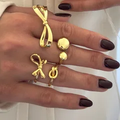 Bow Tie Ring For Women In Zinc Alloy Featuring KC Golden Plated Electroplated Finish With Asymmetrical Design 2