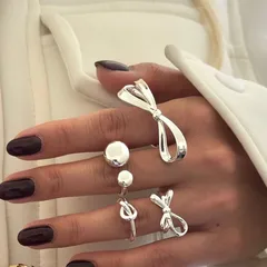 Bow Tie Ring For Women In Zinc Alloy Featuring KC Golden Plated Electroplated Finish With Asymmetrical Design 3