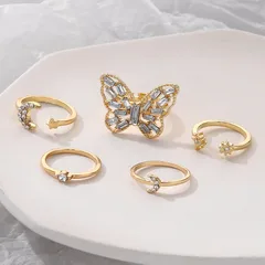 Set Of 5 Gold Alloy Star Rings For Women With Rhinestones, Featuring 0.01µm Coating Thickness 3