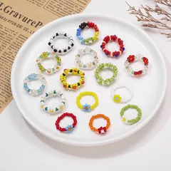 Sweet Flowers Beading Ring For Women Featuring Rice Beads And Elastic Cord Inlay