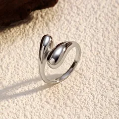Unisex Simple Style Titanium Steel Ring With Asymmetrical Water Droplets Pattern In Gold Featuring Electroplated Finish 3