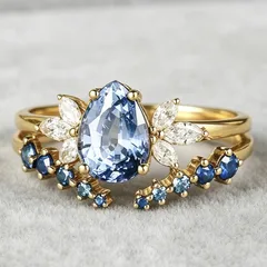 Water Droplets Rings For Women In Royal Blue Featuring September Birthstone Sapphire With Golden Plated Alloy, 1 Pair