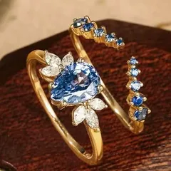 Water Droplets Rings For Women In Royal Blue Featuring September Birthstone Sapphire With Golden Plated Alloy, 1 Pair 2