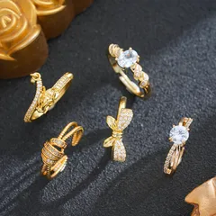 Women's Bow Tie Ring In Titanium Steel With 18K Real Gold Plated PVD Coating And Zircon Inlay