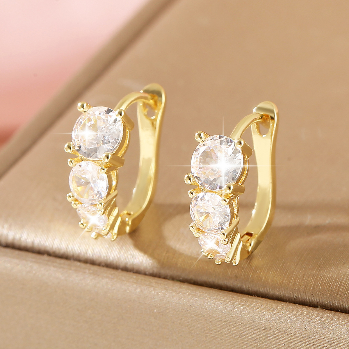 Round Hoop Earrings For Women In Golden Copper With Electroplated Gold Plating And Zircon Inlay