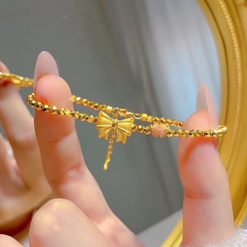 Sweet Bow Tie Bracelet For Women In Silver Plated Copper With Electroplated Gold Plating Process