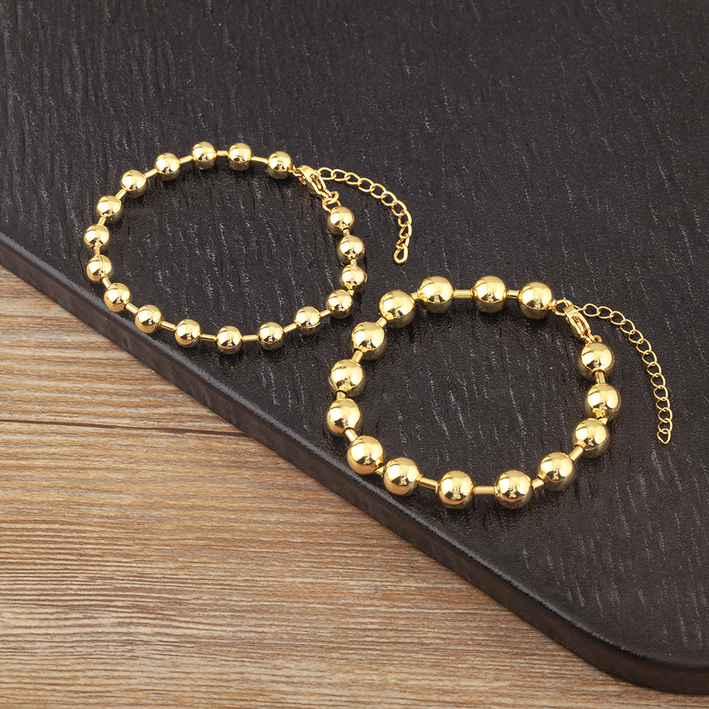 Unisex Round Waterproof Non Tarnish Copper Bracelets With 18K Real Gold Electroplated Plating 4