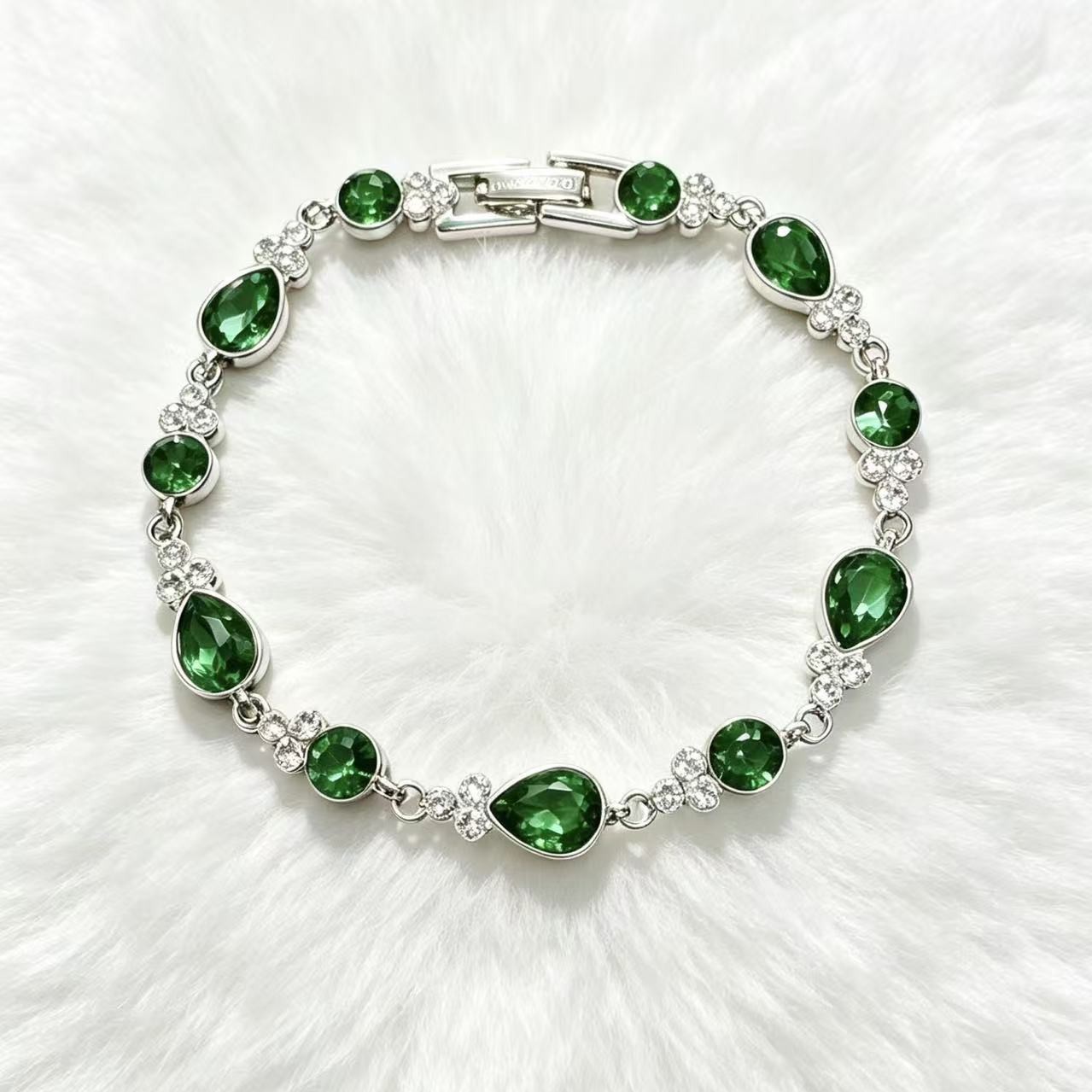 Water Droplets Bracelet For Women In Copper Featuring Crystal Inlay With May Birthstone Emerald Accent